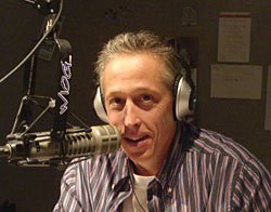 Thomas speaking on the radio